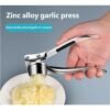 bf88eb83fdd9fd42fc899f573cd1a45e_1766124198100.jpg Stainless Steel Garlic Press Crusher